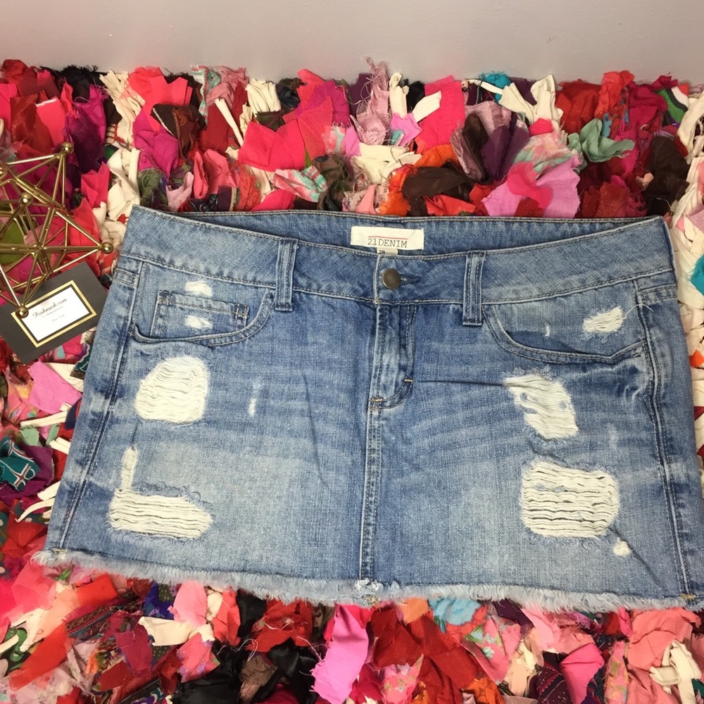 Distressed denim skirt.
